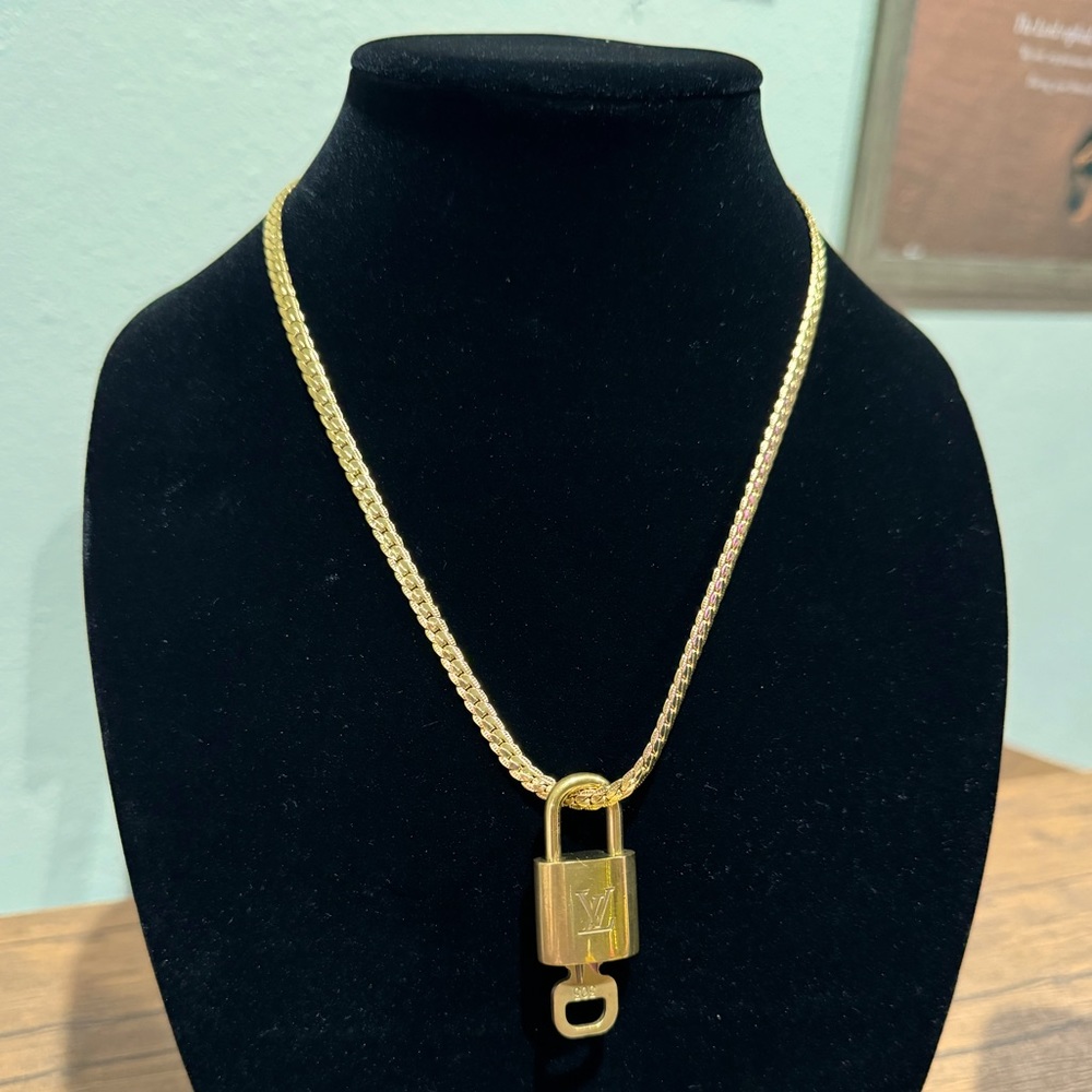 Lv gold lock necklace